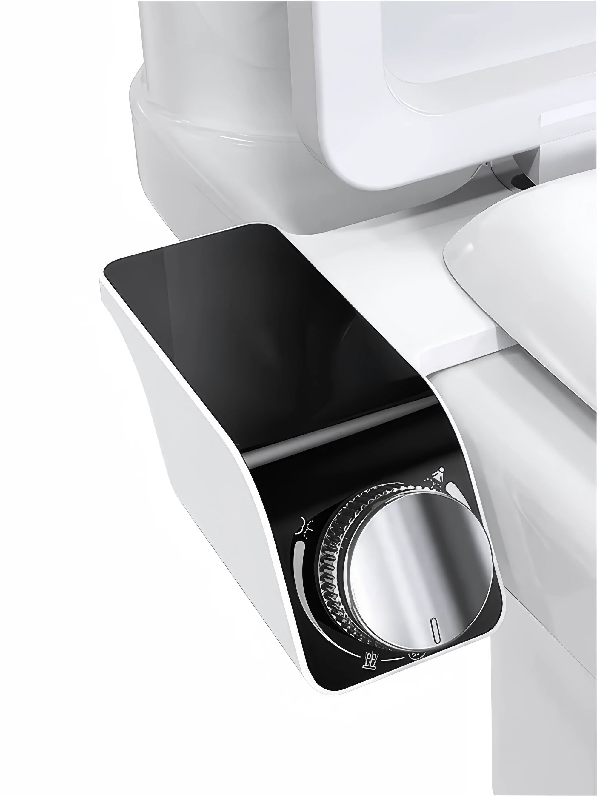 Close-up of a black and silver control panel on a white appliance.